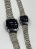 Silver square Casio watches with black dials and metal link bracelets